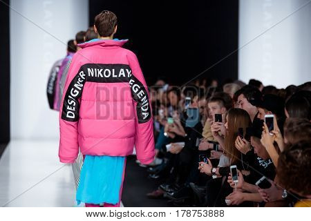 MOSCOW RUSSIA - MARCH 15 2017: Model walk runway for DESIGNER NIKOLAY LEGENDA catwalk at Fall-Winter 2017-2018 at Mercedes-Benz Fashion Week Russia. Men's fashion.