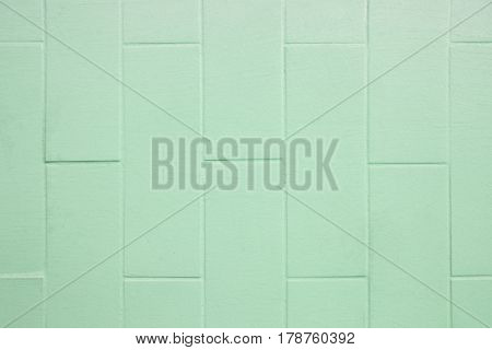 Square green brick wall background and texture