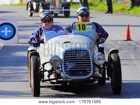 Mignanego Italy - September 25th 2015 - Reenactment 18th Pontedecimo Giovi: Fiat 500B sports conducted by Blacks-Rabitti during a timed regularity 'test.