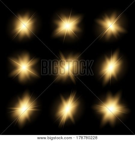 Bright glowing golden flashes in the dark. Footage for editing