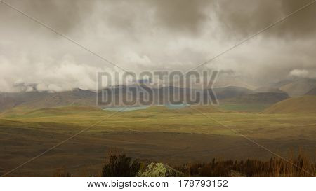 View of La Mica lagoon from the Antisana volcano on a cloudy day in the Antisana Ecological Reserve - Ecuador