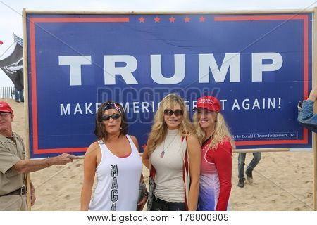 Huntington Beach, CA - March 25 2017: Make America Great Again March. Thousand of Supporters of republican president Donald Trump, march and wave flags, at a MAGA March in Huntington Beach. 




