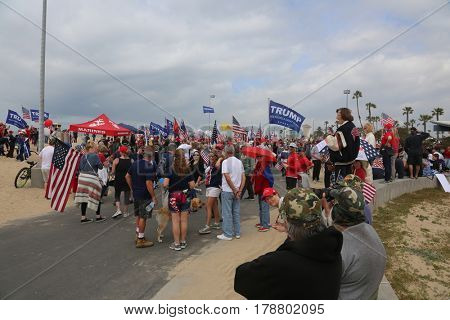 Huntington Beach, CA - March 25 2017: Make America Great Again March. Thousand of Supporters of republican president Donald Trump, march and wave flags, at a MAGA March in Huntington Beach. 




