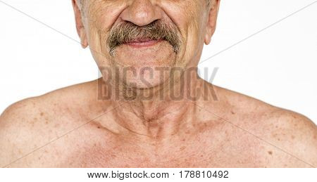 Man doing shirtless close up photo shoot in studio