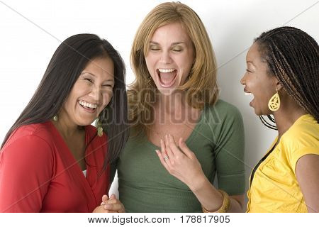 Multicultal and mulitethnic group of women isolated on white.
