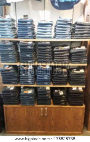 blurred photo, Blurry image, Jeans Denim pants on the shelves