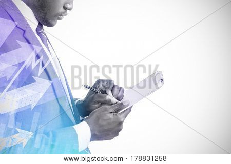 Businessman writing on clipboard against stocks and shares 3d