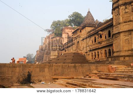 People Doing Yoga And Meditation In Front Of Maheshwar Palace