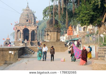 Woman Drying Them Sari On The Ghat Of Maheshwar