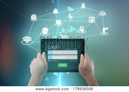 Cropped hand holding digital tablet against technical screen with little pyramids 3d