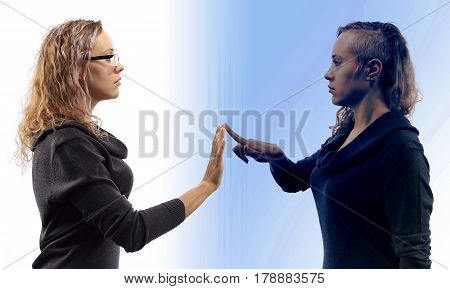 Self talk concept. Young blond caucasian woman talking to herself in mirror reflection showing gestures. Double portrait from two different side views.