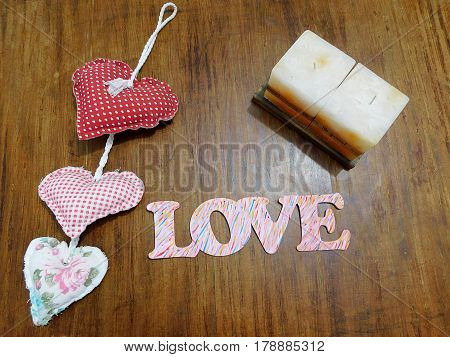 Still life containing candles hearts love and colors
