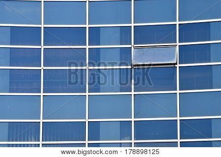 Reflections in Modern glass facade or cloudscape