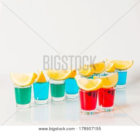Glasses With Blue, Green And Red Kamikaze, Glamorous Drinks, Mixed Drink Poured Into Shot Glasses