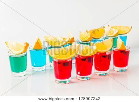 Glasses With Blue, Green And Red Kamikaze, Glamorous Drinks, Mixed Drink Poured Into Shot Glasses