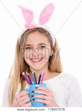 Happy Girl In Bunny Ears With Colorful Pencil In Cup