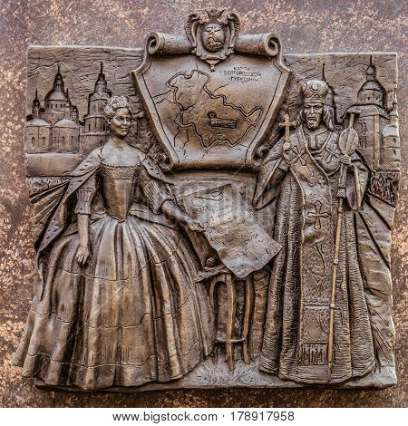 Belgorod Russia -October 08 2016: Historical bas-relief in Belgorod the obelisk of military glory depicting the creation of the Belgorod governorate in 1727 in the image of Empress Catherine I to the decree. Right - Bishop Ioasaph.