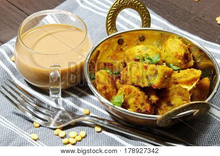 Dry Gatte ki sabji or Dhoka made of chickpea flour or Besan with onions and ginger and other Indian spices.