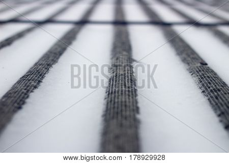 snow on the roof of asbestos. Single focus.