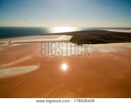 Aerial shot of Koyashskoe pink salt lake firth in Crimea