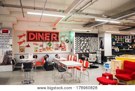 BUCHAREST ROMANIA - APR 1 2016: Interior of KIKA store selling ready-to-assemble kitchen furniture - table chairs other types of home appliances
