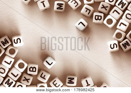 english alphabet cube on white paper background English language learning concept vintage colortone