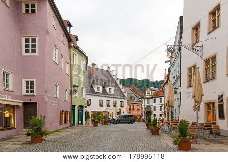 Fussen Germany - June 4 2016: View of pedestrian historical street in Fussen with typical bavarian architecture buildings.