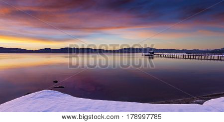 Early morning winter sunrise at Commons Beach in Tahoe City California Lake Tahoe.