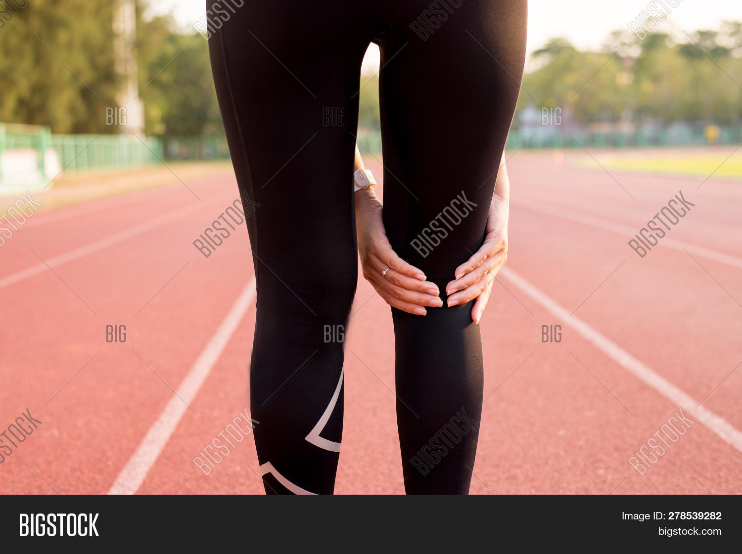 Woman Holds On Knee, Image & Photo (Free Trial) Bigstock