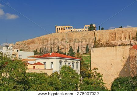 Athens, Attica, Greece - October 17, 2018:  Looking Up At The Parthenon Above The Support Wall On Th