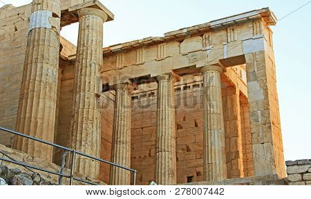 Columns near the entrance and Propylaea to the Acropolis just above the Theater Odeon of Herodes Att