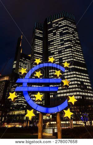 Frankfurt Am Main, Germany - January 08, 2019: Euro Sculpture In Front Of The Eurotower. It Is A Neo