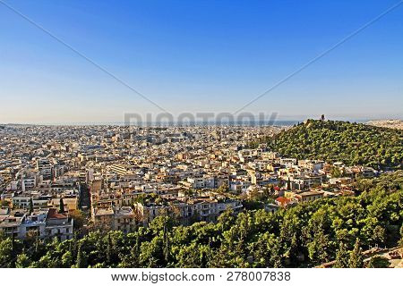 View From Acropolis Hill Of The City Of Athens And The Monument Of Philopappos On Musaios Hill In At