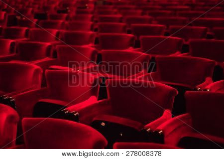 Empty Seats At The Cinema. Row Of Empty Red Seats For Cinema, Theater, Conference Or Concert