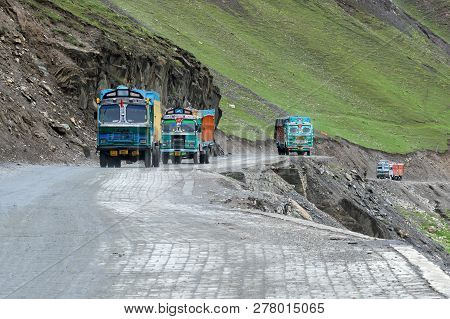 Leh, India - September 1, 2014 : Trucks Carrying Goods Are Passing Through Zojila Pass, A High Mount