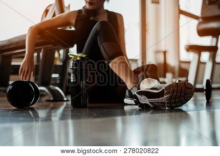 Rows Of Dumbbells In The Gym With Hign Contrast And Monochrome Color Tone.