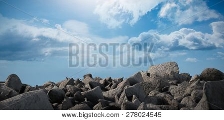 Grey rocks  against blue sky