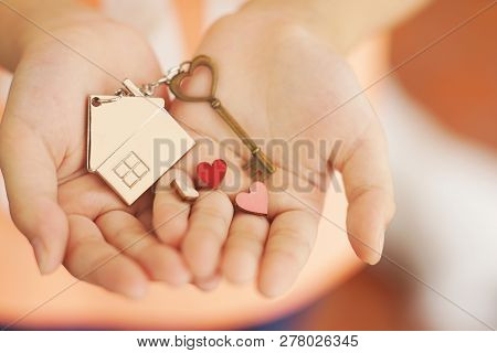 Heart Shape Home Key With House Keyring And Mini Heart Figure On Kid's Hand To Giving, Sweet Valenti