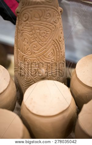 Ceramic Workshop, Unfired Earthenware Jug. Close-up. Made By Hand, A Hobby. Background Illustrating 