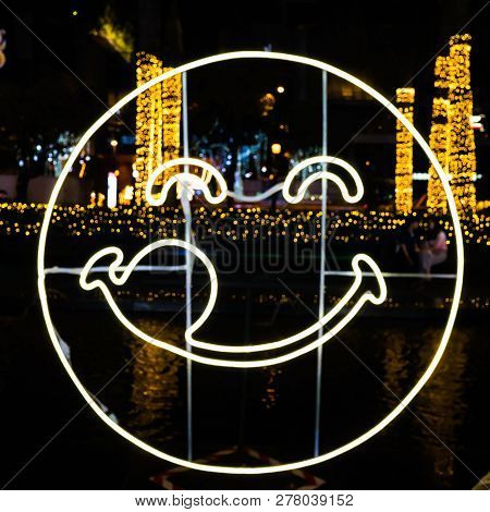Neon Light  Of Humen Face Smile With Blur Background