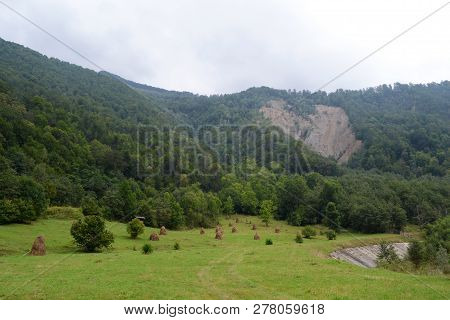 Rural Landscape With Haystacks In Ramnicu Valcea.