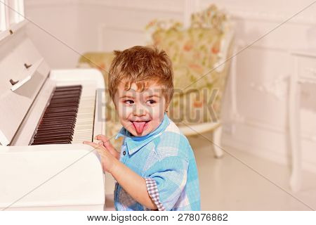 Music. Child Play Piano. Happy Family And Childrens Day. Happy Childhood. Care Development. Music An
