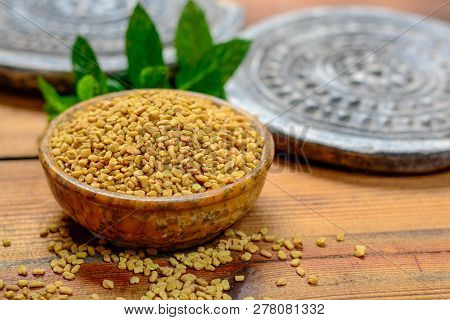 Bowl With Fenugreek Seeds Close Up, Used For Cooking And Traditinal Medicine, Spices Collection