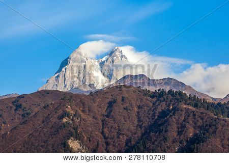Two High Rocky Summits Of Ushba Mountain In Svaneti Region Of Georgia