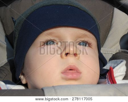 The Spellbound Look Of The Boy Who Saw The Sunset, Illuminated By The Sun The Boy`s Face, Close-up