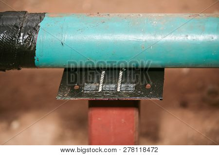 Pipe Support Protection Composite Repair For Corrosion Under Support. Drinking Water Supply System. 