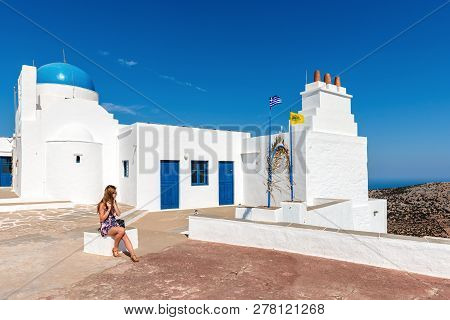 Young Woman Enjoying Holidays In Greece. Sifnos Island, Cyclades, Greece
