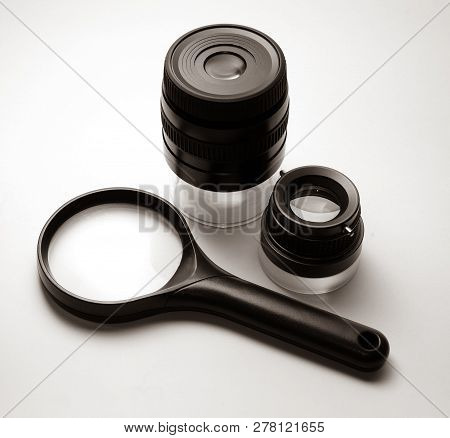 Different Types Of Magnifying Glasses: A One Simple Loupe, One With A Doubly-convex Lens, One With A