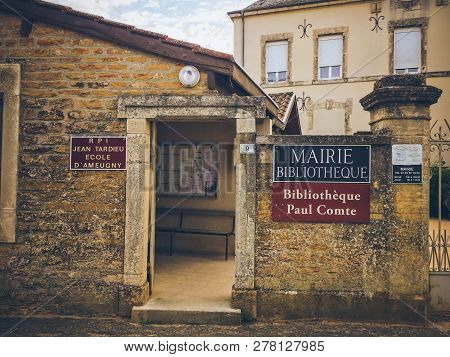 July 19, 2017. Village Ameugny France Burgundy Region In Summer. Old Stone Facade Of The Apartment B