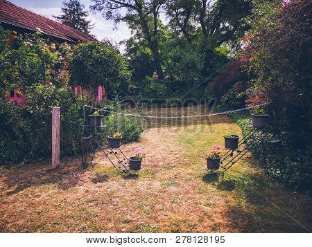 July 19, 2017. Village Ameugny France Burgundy Region In Summer. Old Stone Facade Of The Apartment B